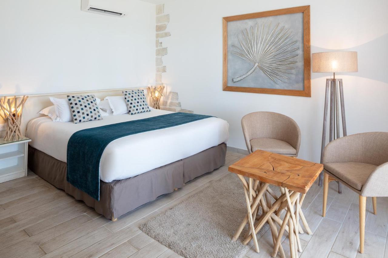 Hotel Le Ruesco Ольмето Экстерьер фото