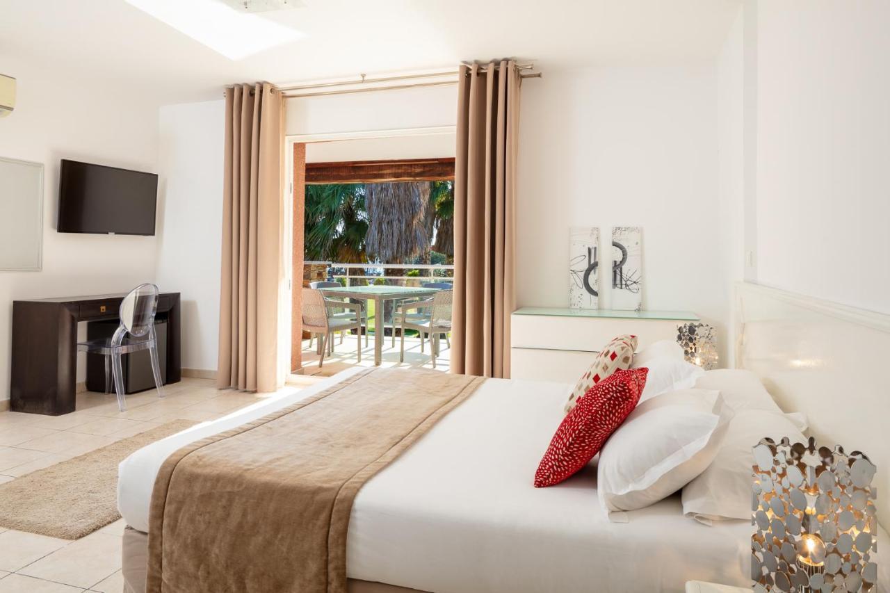 Hotel Le Ruesco Ольмето Экстерьер фото